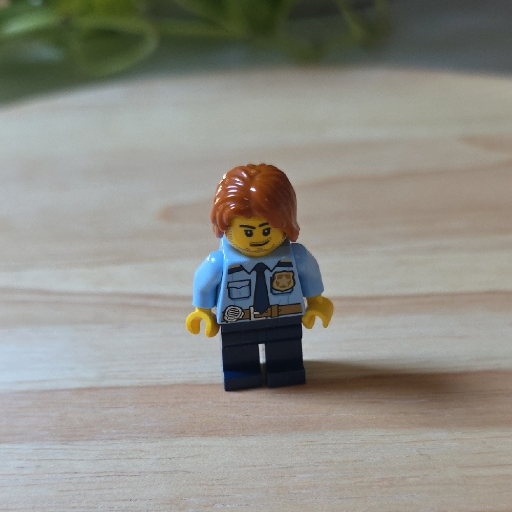 LEGO Police Minifigure with Blue Shirt and Red Hair